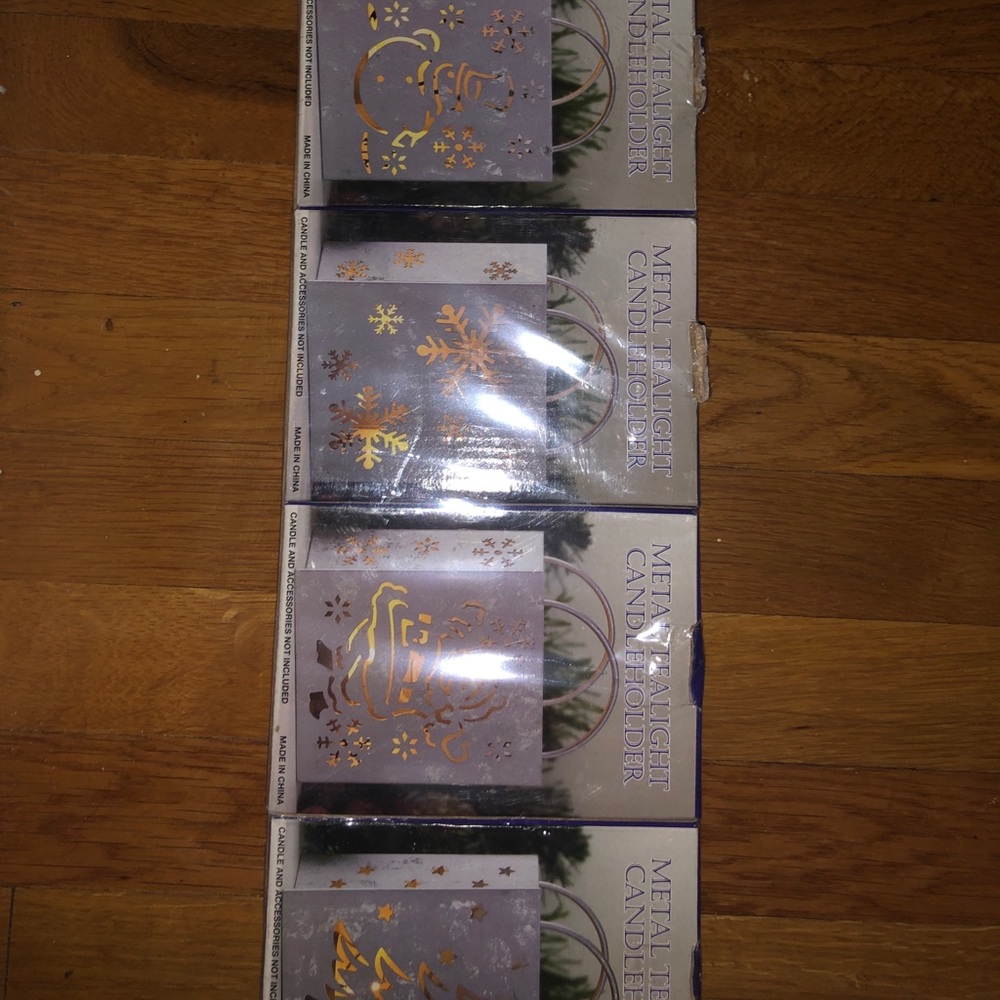 Metal tea light candle holder